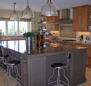 Deer Lake Renovation Kitchen with large work island and custom cabinetry.